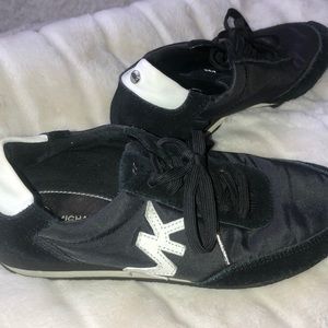 Black and white Michael Kors runners